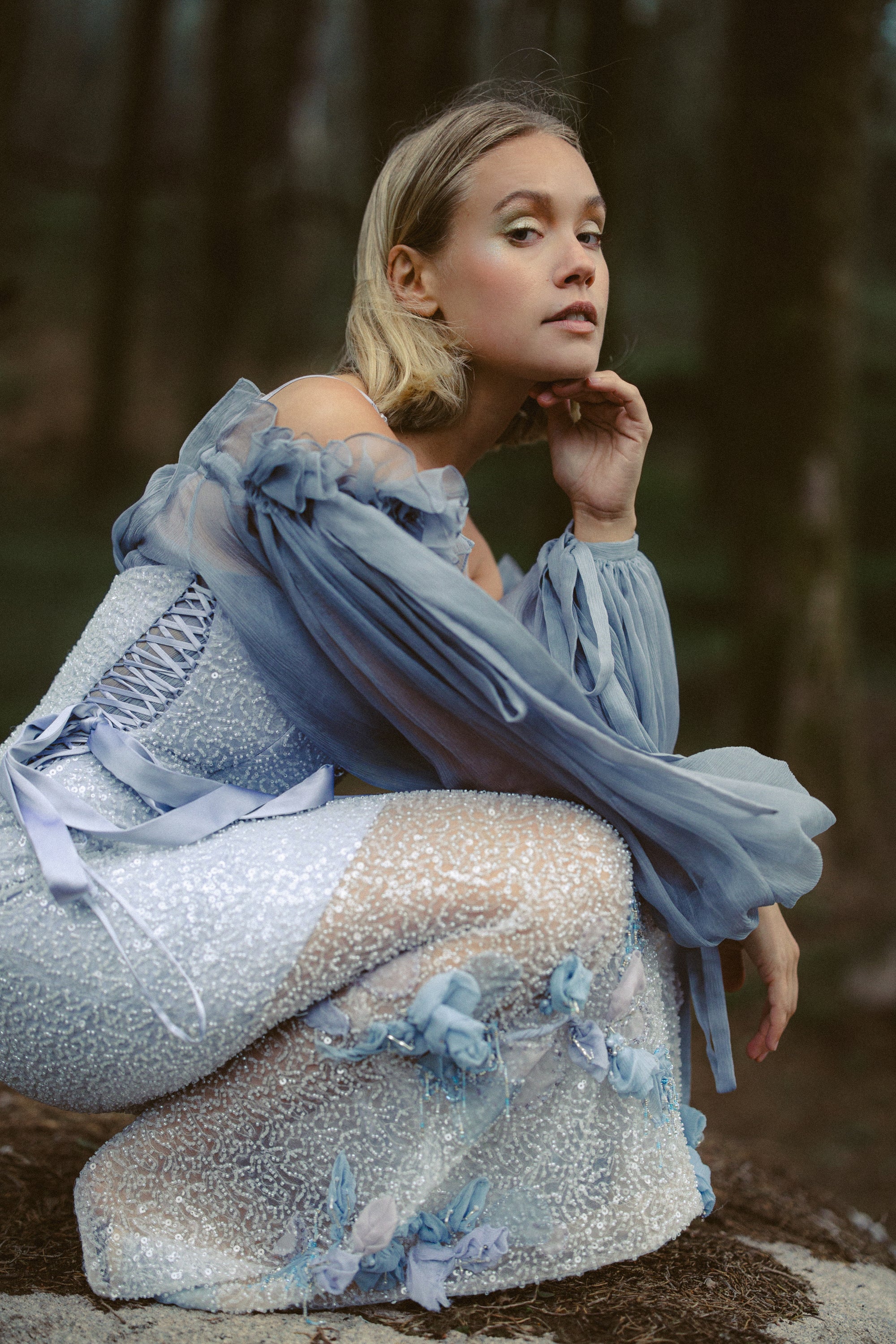 Laetisse whimsical wedding dress by MYWONY — off-the-shoulder storm-grey silk chiffon bridal gown, forest portrait setting