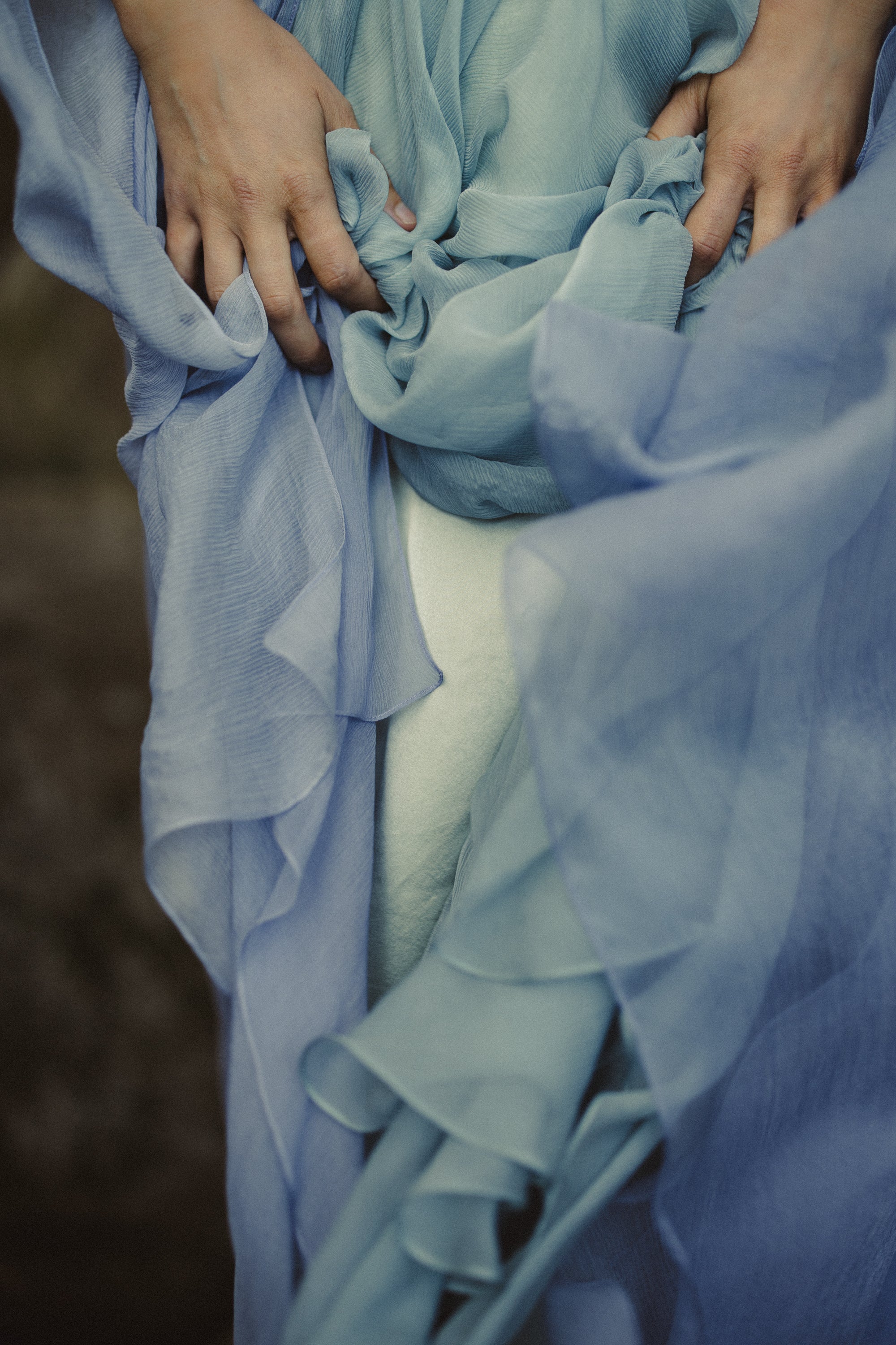 Aéliea unique wedding dress close-up — gathered skirt fabric with multicolored pleating texture detail — custom made by MYWONY Bridal