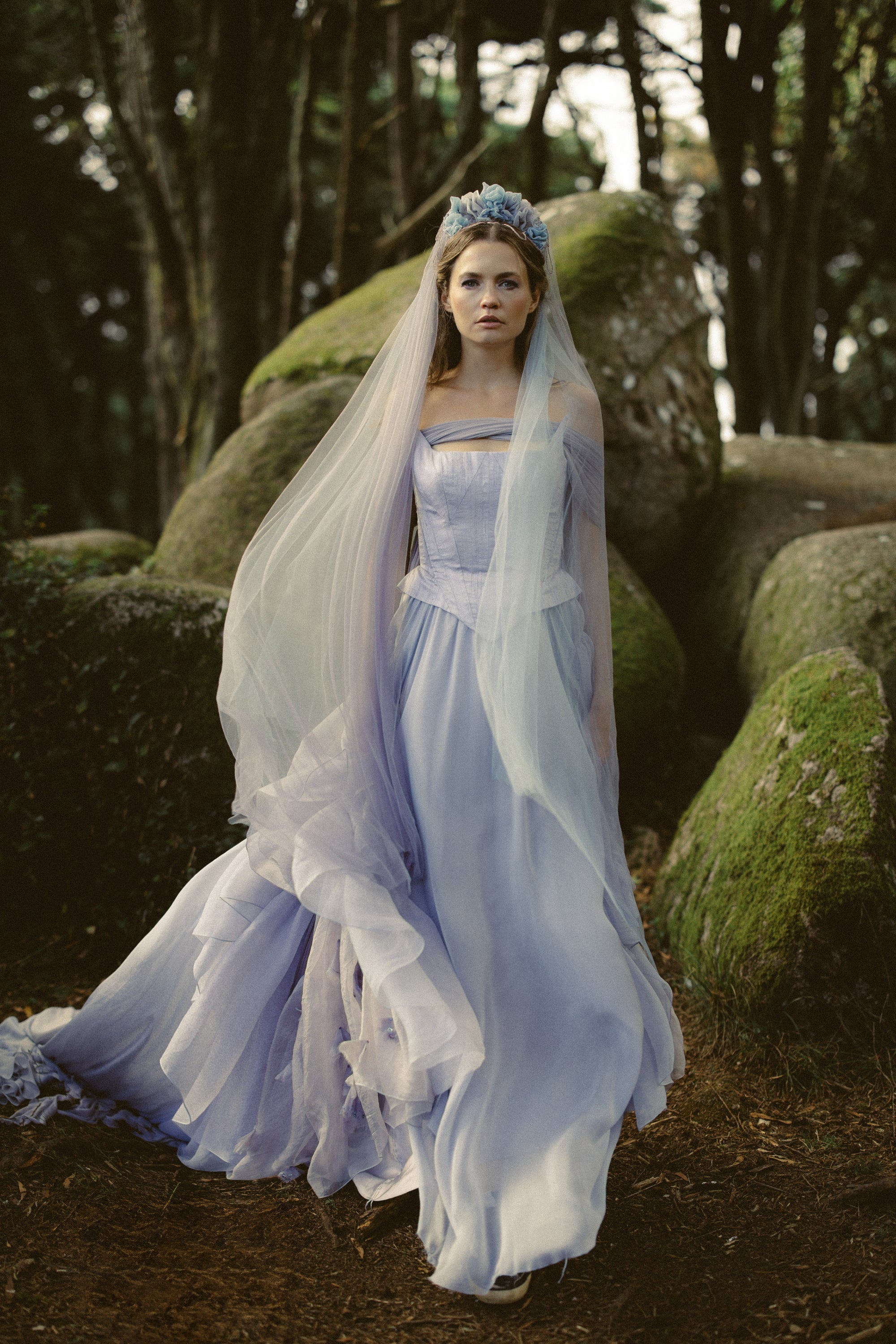 Blooming Veil full-length bridal look with two-toned lavender tulle veil and silk flower headpiece in enchanted forest setting by MYWONY