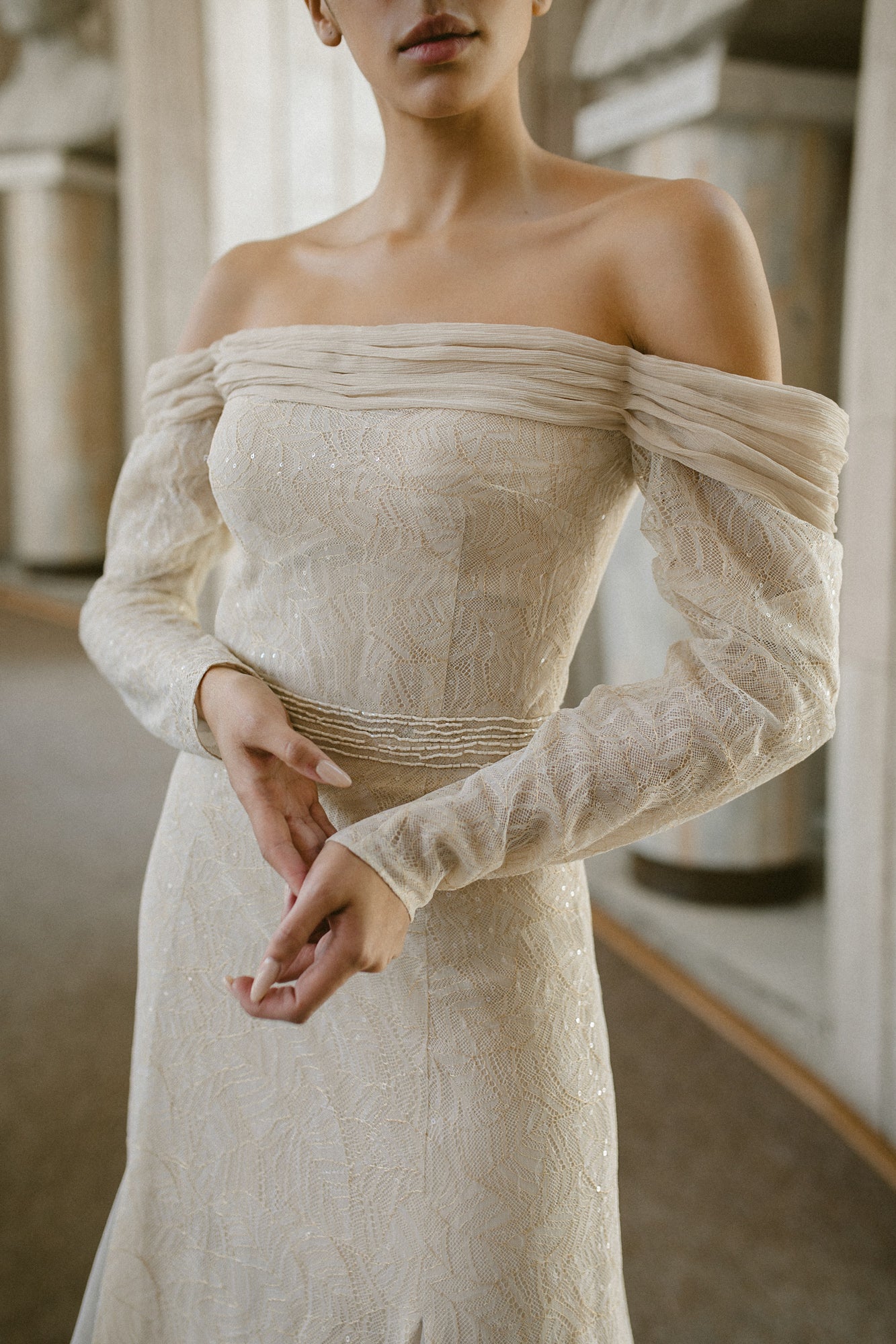 Illusion neckline and sheer detailing on the Mýwony Ophelia wedding dress — 2026 trend